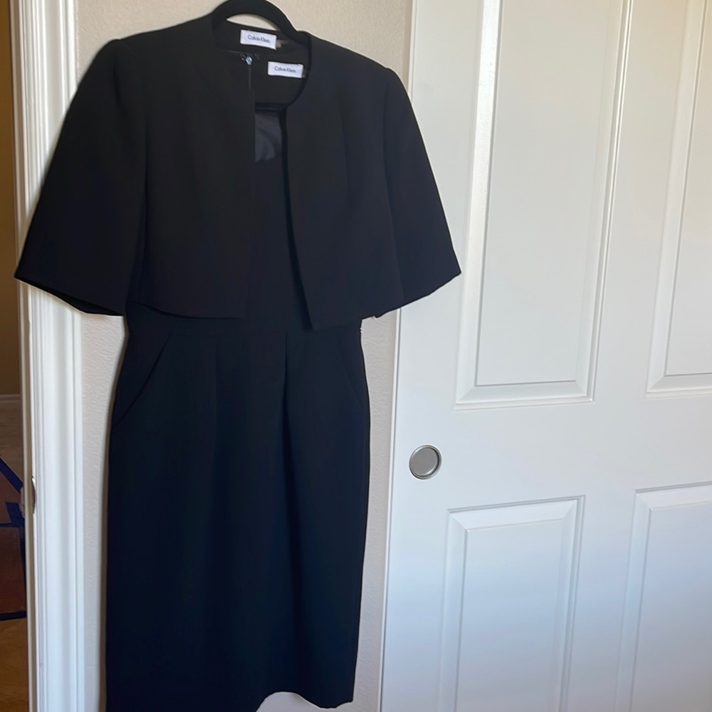 Elegant black dress and jacket